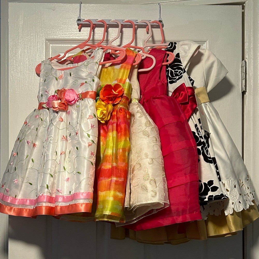 New collection of dresses for a little Dive.  Five are size 2T, and one 24Mo.